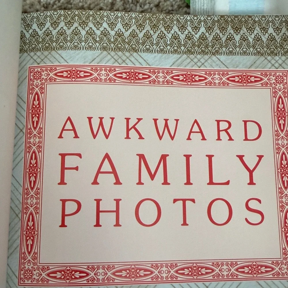 Urban Outfitters Awkward Family Photos paperback- Red, Gold